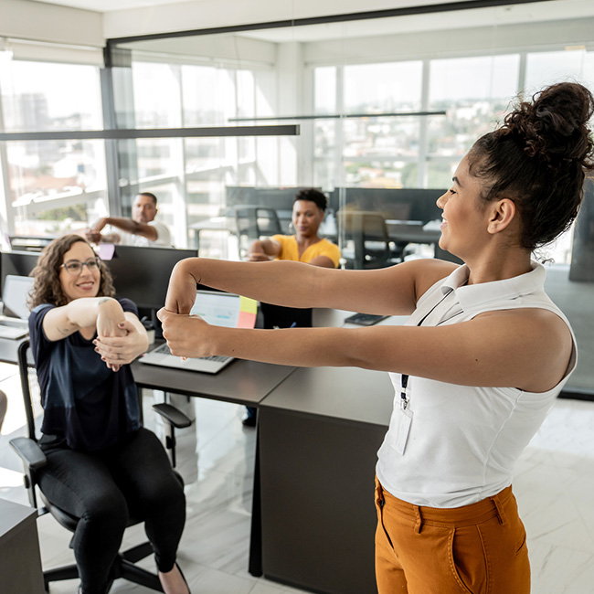 Workers exercising in the office