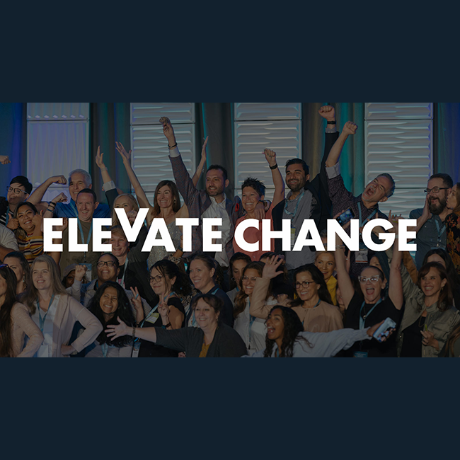 A crowd smiling and cheering